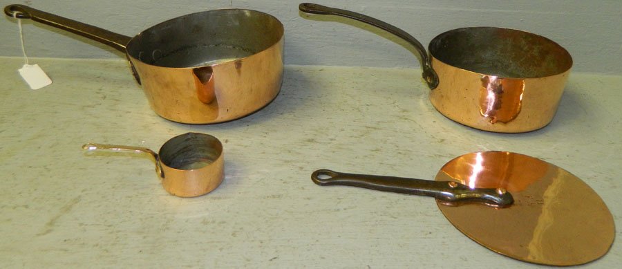 (3) 19th Century copper pans and a top.: (3) 19th Century copper pans and a top.