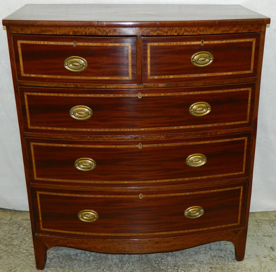 19th C mah bowfront inlaid Hepplewhite chest.: 19th Century mahogany bowfront inlaid Hepplewhite chest. 40" wide x 21" deep x 46" tall.