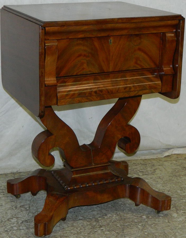 Mahogany empire work table with drop leaves.: Mahogany empire work table with drop leaves. 43 1/2" open x 17 1/2" x 30 1/2" tall.