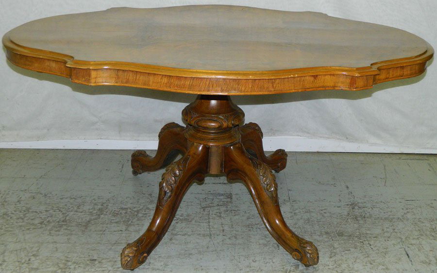 English burl walnut loo table.: English burl walnut loo table. 55 3/4" x 41" x 28" tall.