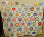 Multi-circle quilt made by Helen Offre in Tulsa.