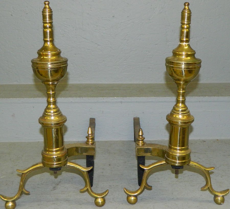 Pair of brass andirons.: Pair of brass andirons.