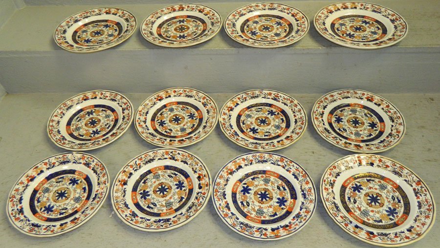 Set of 12 Ironstone luncheon plates.: Set of 12 Ironstone luncheon plates. 8 1/2" diameter.