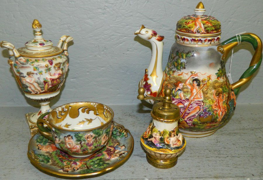 Various Capodimonte pieces.: Capodimonte teapot, cup and saucer, pepper grinder and a covered jar. Teapot 8" tall, cup and saucer 2 1/2" tall.