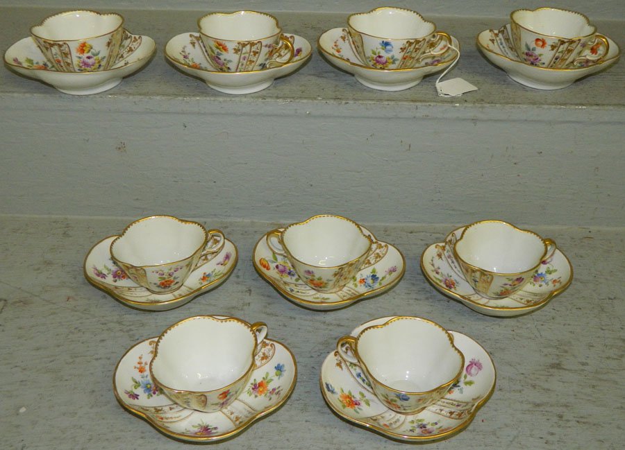 Set of 8 Dresden cups and saucers.: Set of 8 Dresden cups and saucers, one odd saucer. 2 1/2" tall.