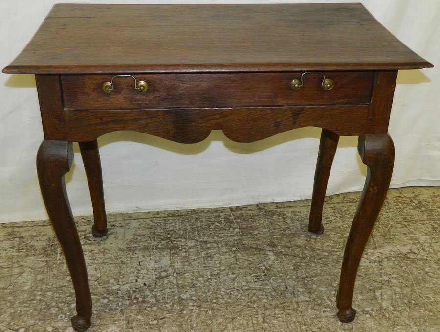18th C Queen Anne French style oak work table.: 18th Century Queen Anne English oak French style oak work table. 33" wide x 21" deep x 28" tall.