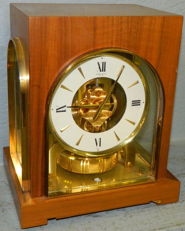 Cosmos clock. 8" wide x 5 1/2" deep x 10" tall.: Cosmos clock- Gruen Guild, Swiss. 8" wide x 5 1/2" deep x 10" tall.