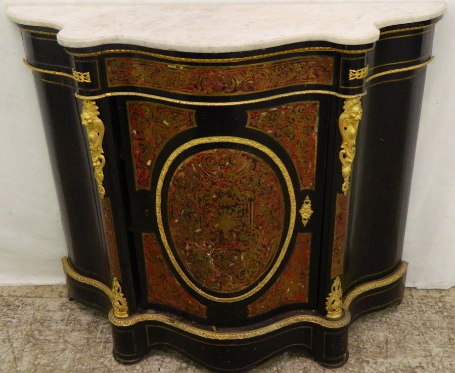 French serpentine front mt commode.: Boulle, brass and bronze French serpentine front marble top commode. Front needs some restoration and some restoration pieces included inside. 50 1/2" wide x 16" deep x 42 1/2" tall.