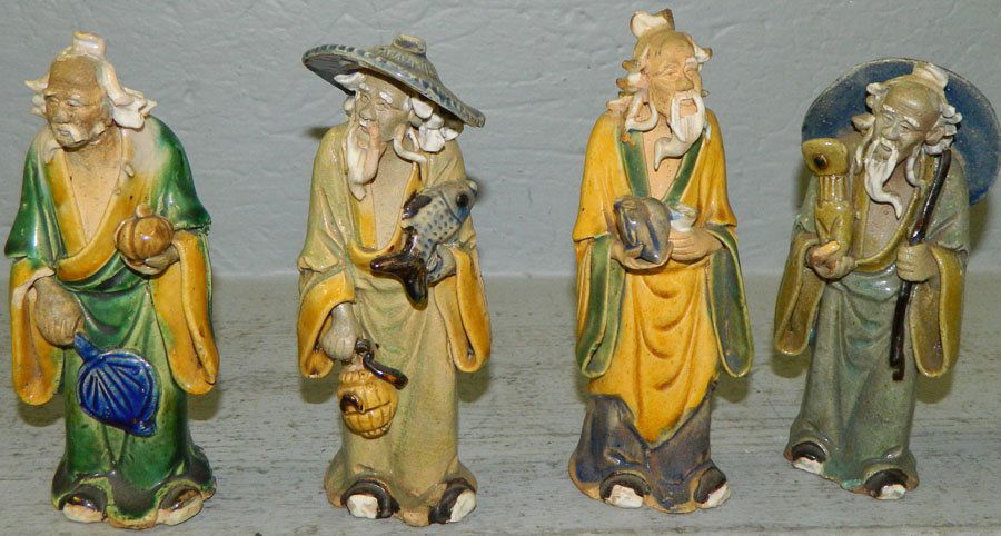 (4) Early Chinese mud men. 6 1/2" tall.: (4) Early Chinese mud men. 6 1/2" tall.