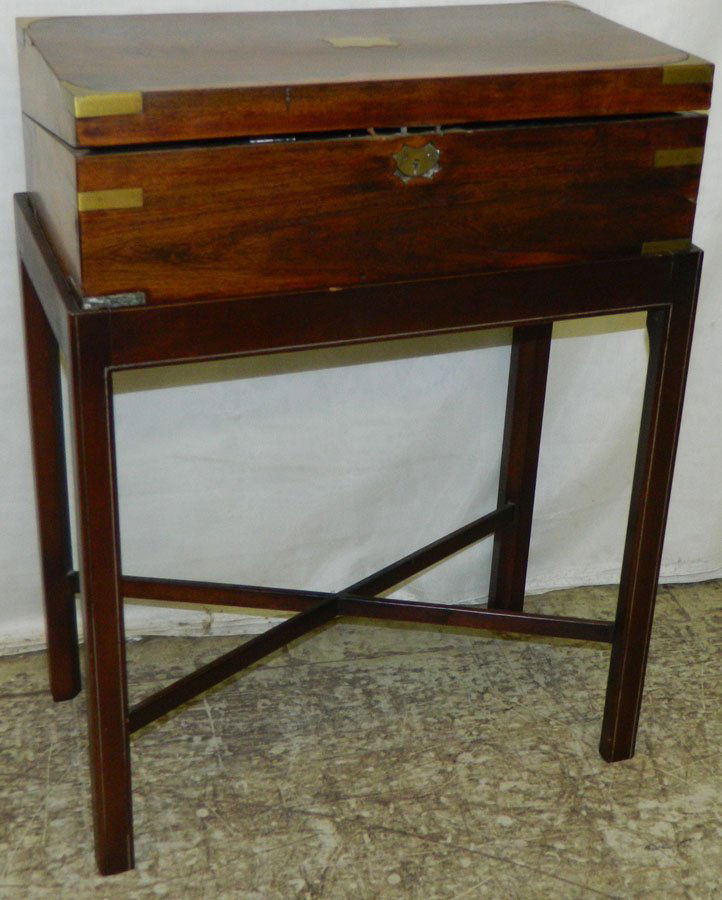 Walnut brass bound lap desk on mah stand.: Walnut brass bound lap desk on mahogany stand with leather interior. 20" wide x 10" deep x 27" tall.