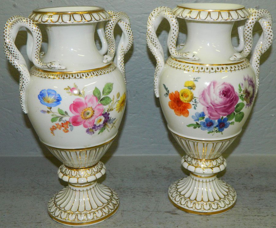 Pair of Meissen urns with snake handles.: Pair of Meissen urns with snake handles and cross sword mark. 11" tall.