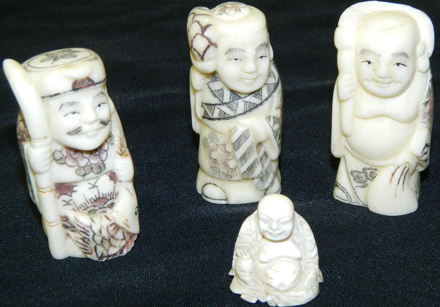 (4) Bone netsukes and a small bone buddha.: (4) Bone netsukes and a small bone buddha. All netsukes are artist signed.