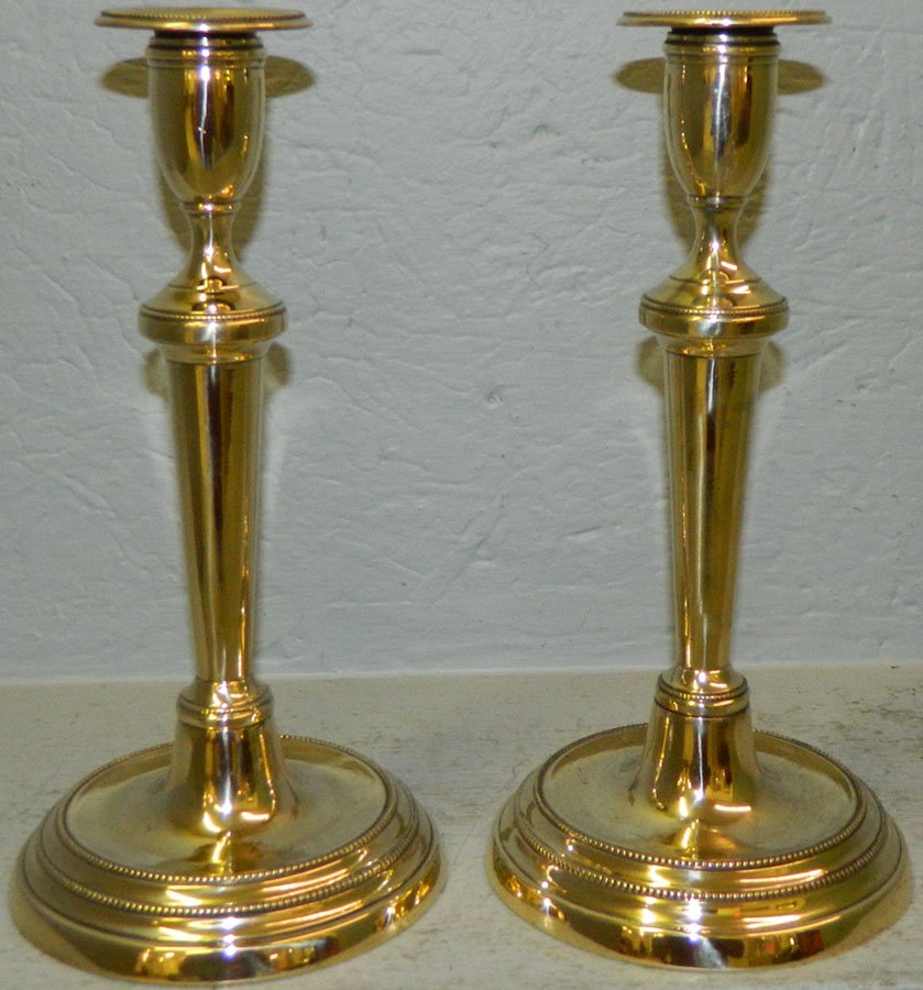 Pair of 19th Century turn base brass candlesticks.: Pair of 19th Century turn base brass candlesticks, polished for sale. 10 1/4" tall.