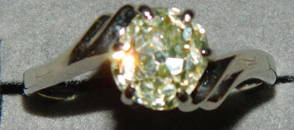 Diamond solitaire ring, stamped 14K.