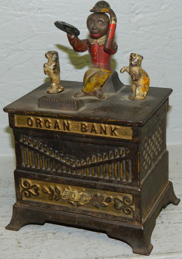 Cast iron mechanical organ bank.: Cast iron mechanical organ bank.