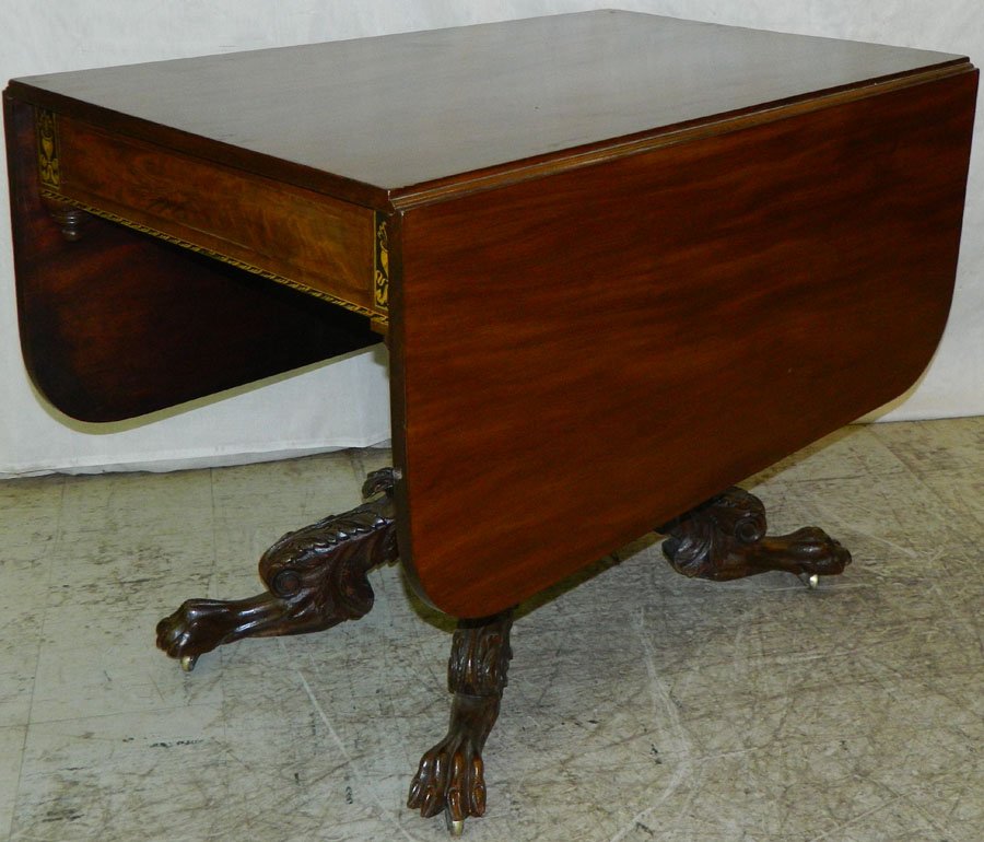 Beautiful inlaid mahogany empire drop leaf table.: Beautiful inlaid mahogany empire drop leaf table with lion claw feet. 58" open x 40" long x 29 1/2" tall.