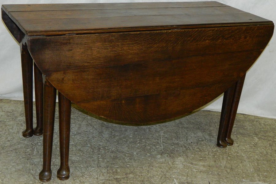 18th C English oak QA drop leaf wake table.: 18th Century English oak Queen Anne drop leaf wake table. 53" open x 49" long x 27 1/2" tall.