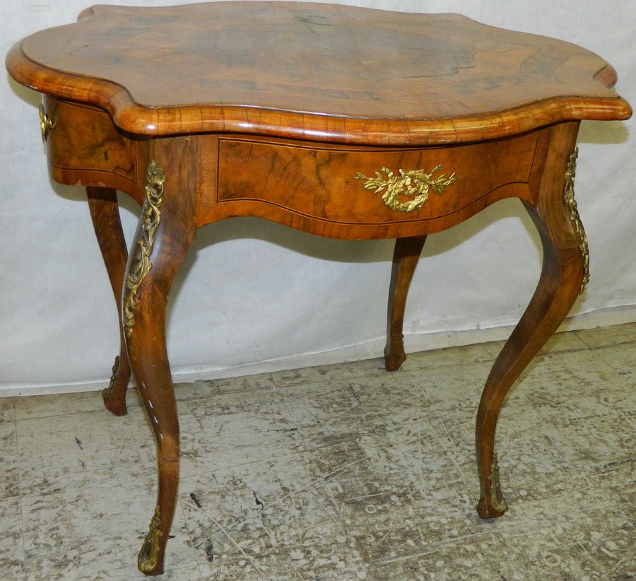 French inlaid marquetry turtle top table.: French inlaid marquetry turtle top table. 31 3/4" wide x 22 1/4" deep x 27" tall.