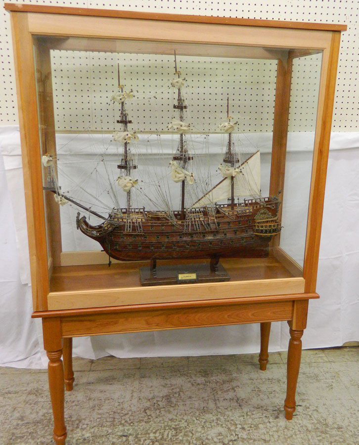 Ship's model, signed Furieux, in case.: Ship's model, signed Furieux, in case. 38" wide x 17 1/2" deep x 57 1/2" tall.
