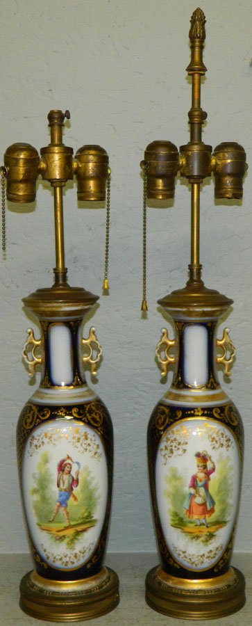 Pair of flow blue porcelain portrait lamps.: Pair of flow blue porcelain portrait lamps. 26 1/2" tall.