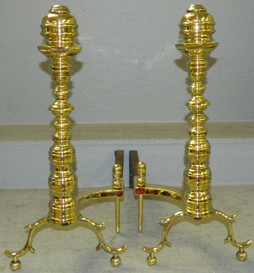 Pair of polished brass andirons. 20 1/2" tall.: Pair of polished brass andirons. 20 1/2" tall.