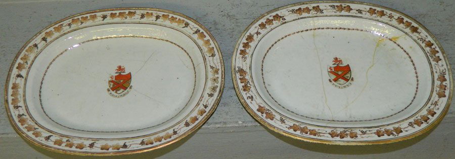 Pair of 18th Century export chargers.: Pair of 18th Century export chargers; both with restoration. Both have coat of arms with Fumis. 11 1/2" long.