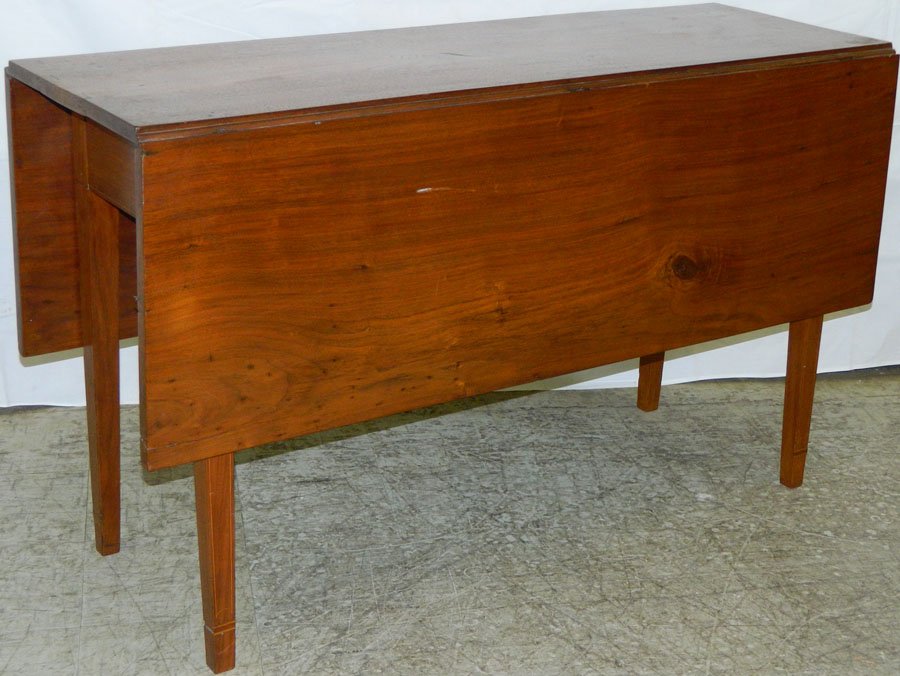 Mahogany drop leaf table with three board top.: Mahogany drop leaf table with three board top. 46" open x 48" x 28" tall.