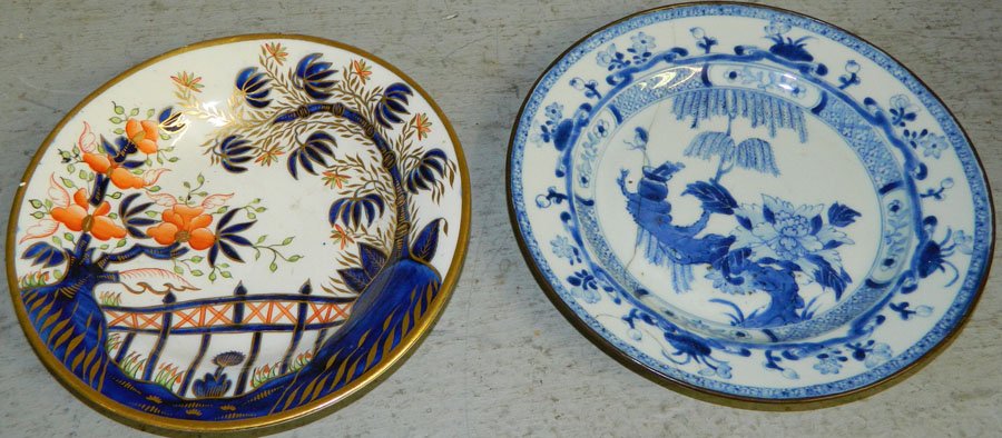 18th C export plate and Crown Derby plate.: Early 18th Century export plate with staple repairs and an early unmarked Crown Derby plate. 8 1/2" and 9" diameter.