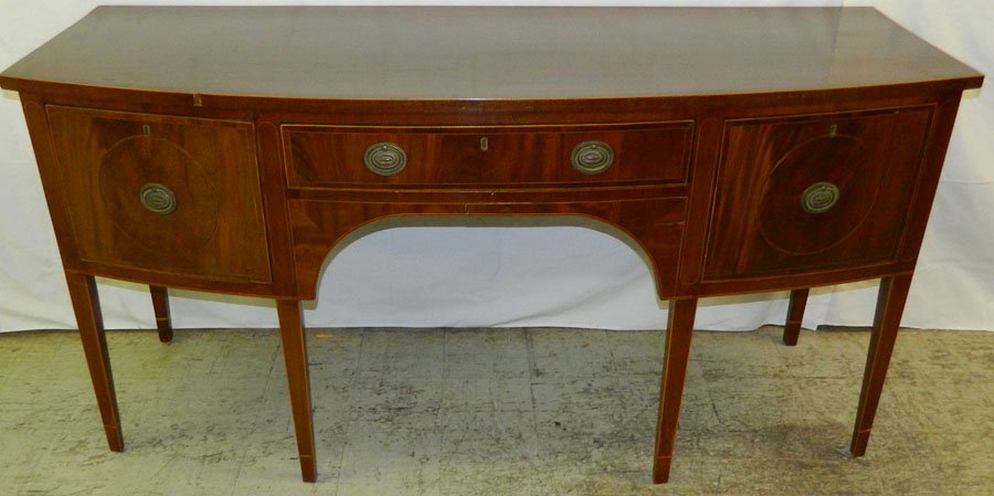 Late 1800's inlaid HW mah bowfront sideboard.: Late 1800's inlaid Hepplewhite mahogany bowfront sideboard with cellarette drawer. 72" wide x 27" deep x 35" tall.