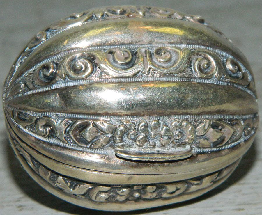 English sterling silver nutmeg grater.: English sterling silver nutmeg grater, circa 1855, Birmingham, England. 1 1/2" long.
