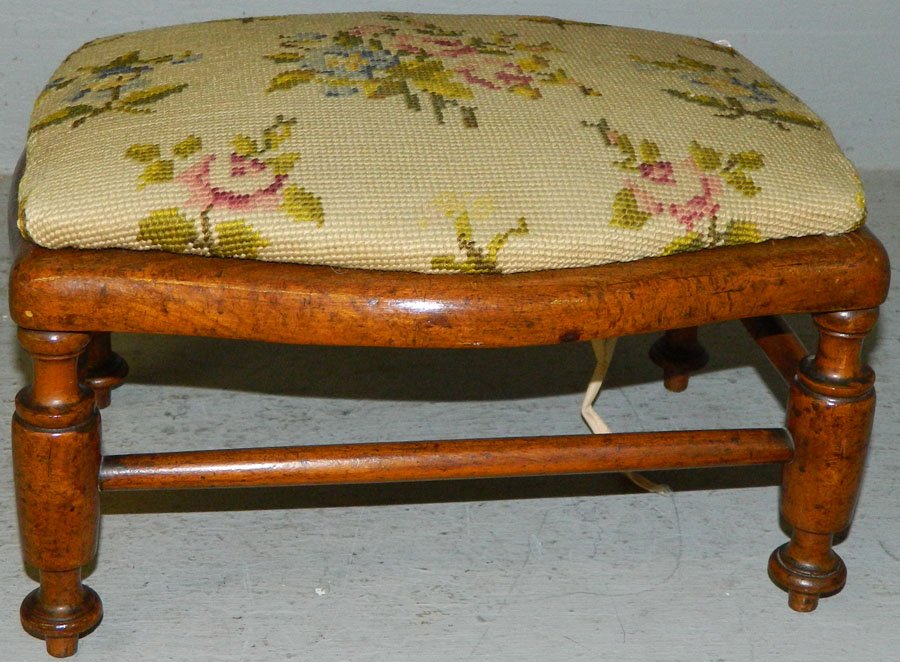 Needlepoint stool with cane bottom.: Needlepoint stool with cane bottom. 13 1/2" x 7" tall.
