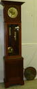 Oak grandfather clock with music box.