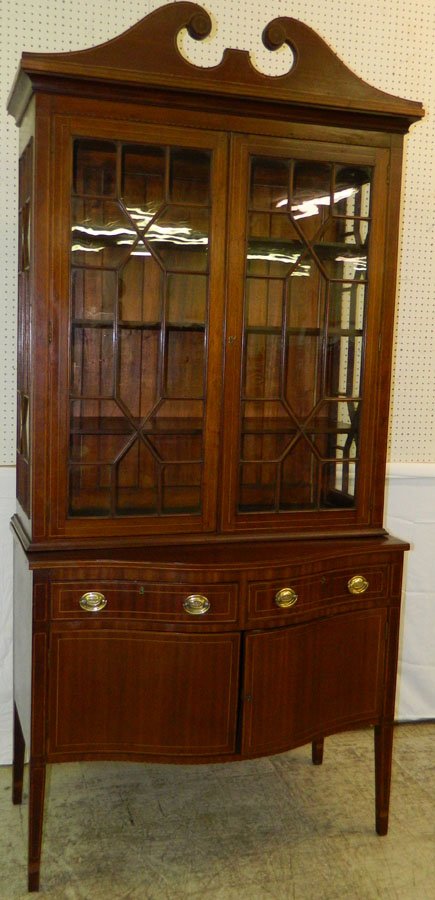 Inlaid mahogany bowfront china cabinet.: Inlaid mahogany bowfront china cabinet. 45" wide x 23" deep x 97" tall.