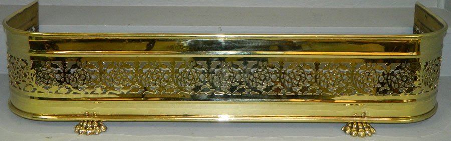 Brass pierced fire fender. 42 1/2" wide.: Brass pierced fire fender. 42 1/2" wide.