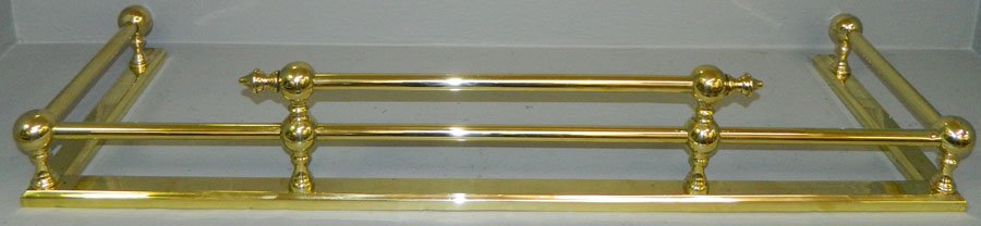 Brass fender. 42" long x 14" deep.: Brass fender. 42" long x 14" deep.