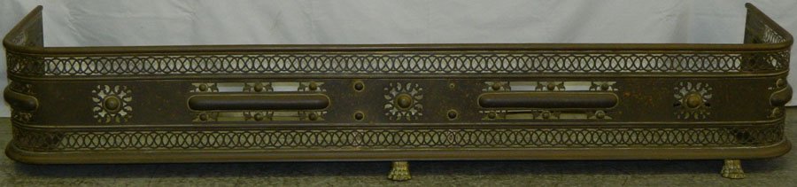 Large brass pierced fender. 70" long x 17" deep.: Large brass pierced fender. 70" long x 17" deep.