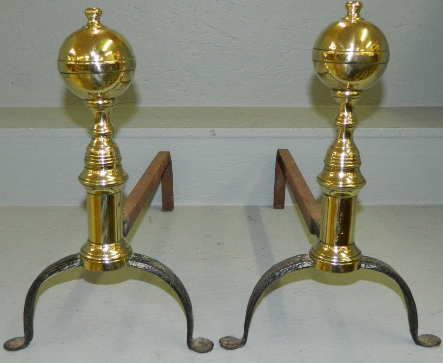Pair of small brass and wrought iron andirons.: Pair of small brass and wrought iron andirons. 14 1/2" tall.