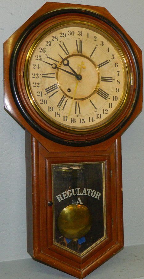 Ansonia regulator calendar clock. 32" tall.: Ansonia regulator calendar clock. 32" tall.