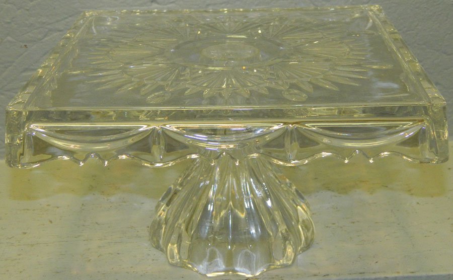 Large square pattern glass cake stand.: Large square pattern glass cake stand. 10" x 10" x 6 1/4" tall.