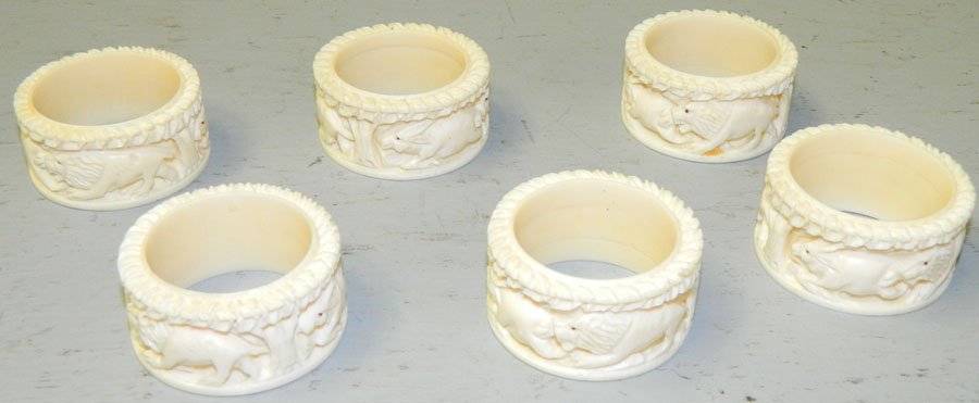 Lot of 6 carved ivory napkin rings w/animal motif.: Lot of 6 carved ivory napkin rings with animal motif. 2" diameter.