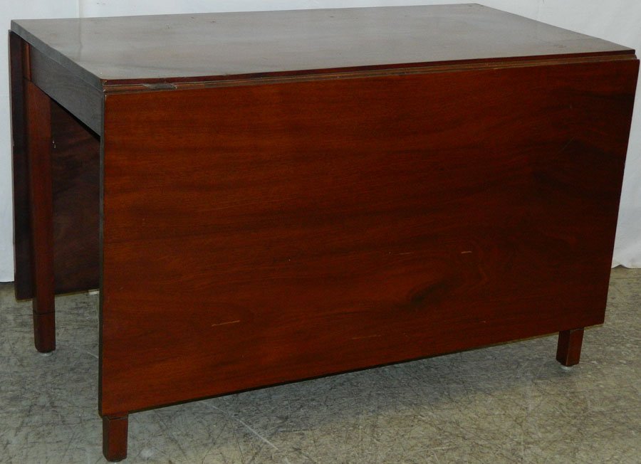 Mahogany three solid board drop leaf table.: Mahogany three solid board drop leaf table. 69 3/4" open x 46" x 29 1/2" tall.