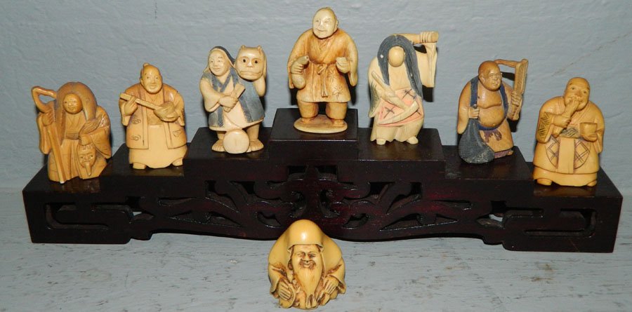 Eight Bone Netsukes with stand 2" stand 12"l: Eight Bone Netsukes with stand 2" stand 12"l