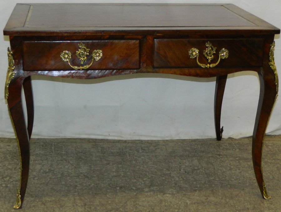 Tooled leather top worktable w/ bronze ormolu.: Tooled leather top worktable w/ bronze ormolu. 25 1/2" x 28 1/4h x 42"