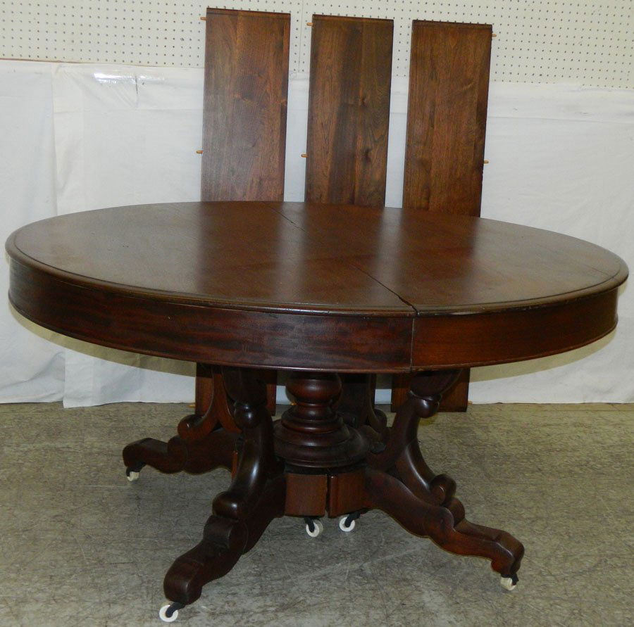 Walnut center pedestal round dining room table