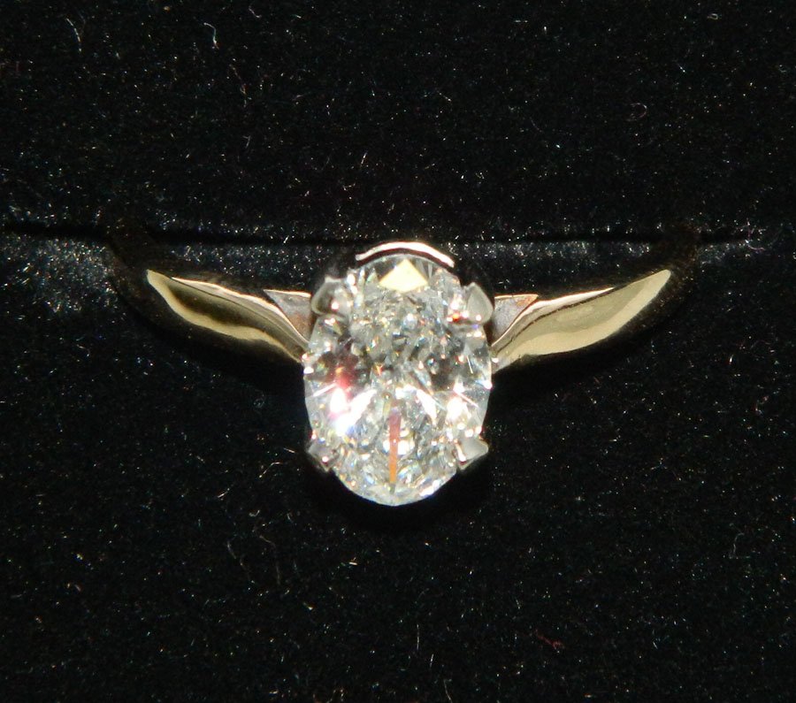Oval diamond solitaire ring. Approx. 1.5 ct.: Oval diamond solitaire ring. Approx. 1.5 ct. Ring is marked 14K. Appraised value $8,500.00