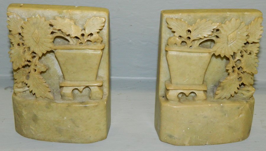 Pair Chinese hand carved soapstone bookends: Pair Chinese hand carved soapstone bookends w/floral vase motif.