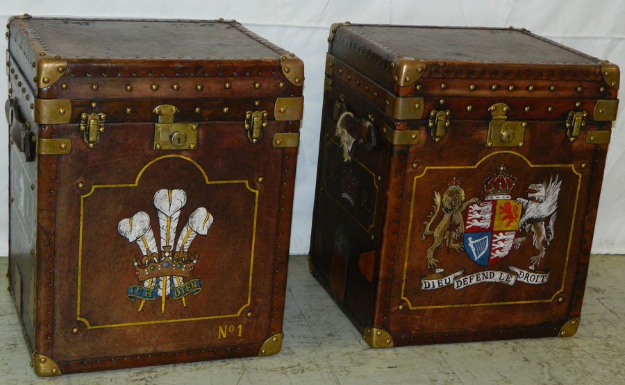 Two (2) painted leather travel trunks: Two (2) painted leather travel trunks w/ Spencer Royal Arms crest "Dieu Defende Le Droit" (God and My Right). 18" x 16" x 22 1/2".