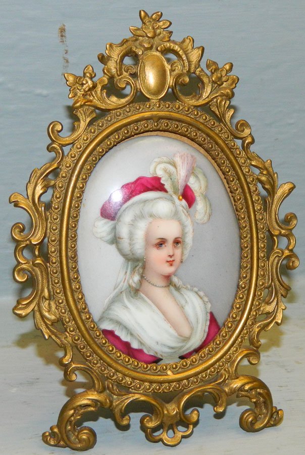 H.p. porcelain Vict. portrait in gilt bronze frame. (1 of 2)