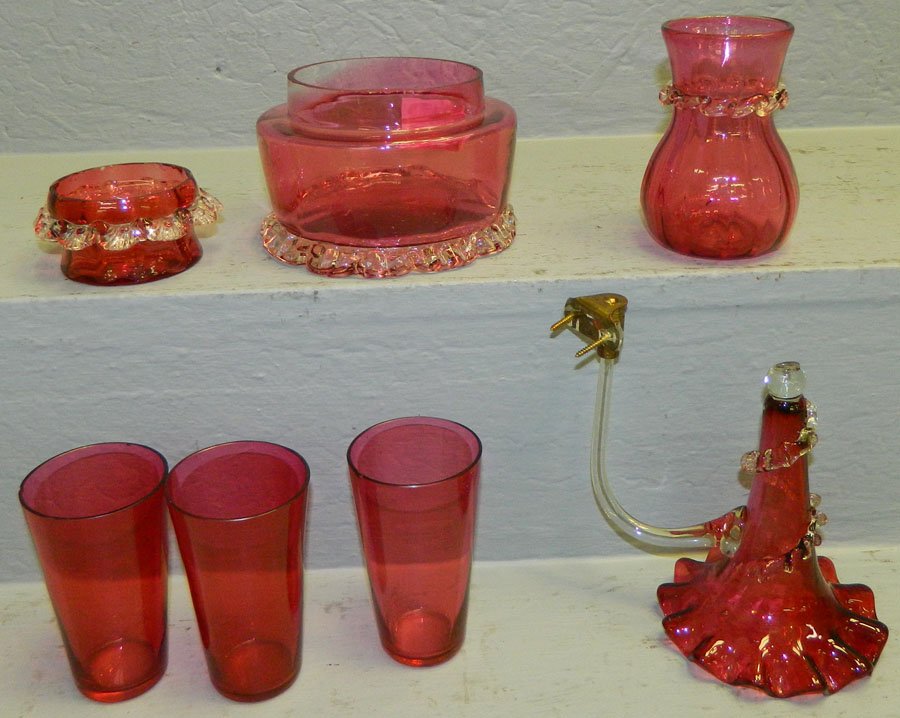 7 pieces cranberry glass, includes epergne arm.: 7 pieces cranberry glass, includes epergne arm.