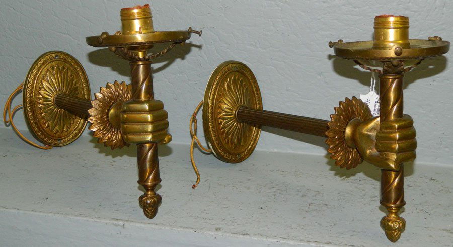 Pair of brass wall sconces in the form of "hands". (1 of 1)